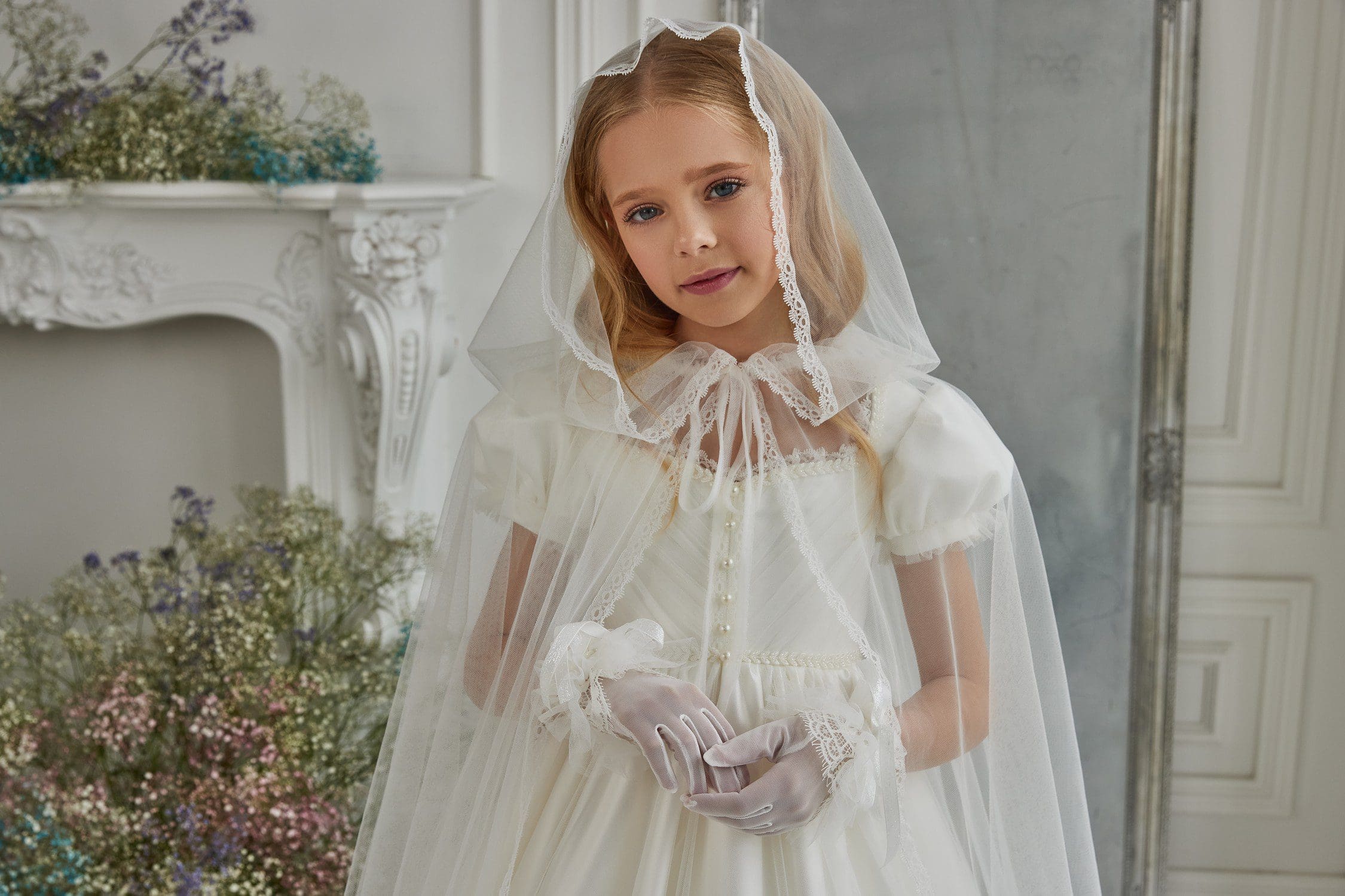 Designer White Holy Communion Dresses at Quinn Harper Children's Occasion Wear in 331 Kings Road Chelsea London SW3 5ES UK